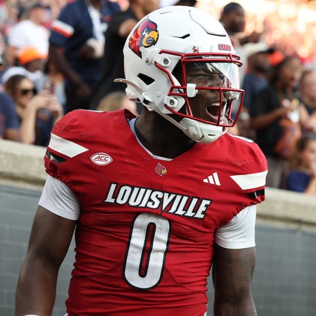 Louisville's Chris Bell celebrates a touchdown against Virginia at L&N Federal Credit Union Stadium Stadium on Oct. 04, 2025.