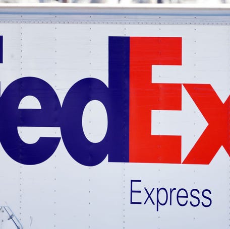 The FedEx logo is displayed on a FedEx delivery truck in Los Angeles.