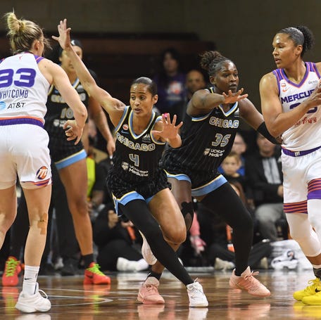 Skylar Diggins (4) and Aicha Coulibaly (35) run to defend while playing against the Phoenix Mercury on Saturday, April 25 at the Sanford Pentagon in Sioux Falls, South Dakota.