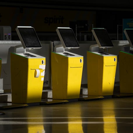 The Spirit Airlines ticket counter at Detroit Metro Airport is closed down after the airline shut down overnight on May 2, 2026, in Romulus, Michigan.