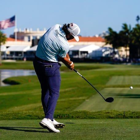 Cameron Young plays his tee shot on the 18th hole during Saturday's third round of the Cadillac Championship at Doral's Blue Monster course.