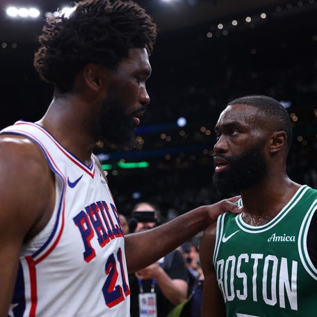 Joel Embiid of the Philadelphia 76ers and Jaylen Brown of the Boston Celtics embrace after the 76ers defeated the Celtics 109-100 in Game Seven of the First Round of the NBA Eastern Conference Playoffs at TD Garden on May 2, 2026 in Boston, Massachusetts.