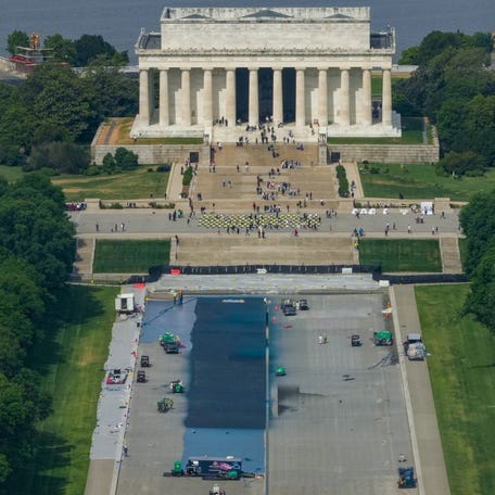 A general view from the Washington Monument of the Lincoln Memorial as workers continue renovations on the Reflecting Pool, which is painted blue, in Washington, D.C., U.S., May 2, 2026.
