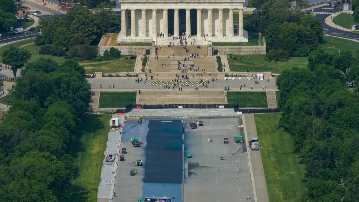 A general view from the Washington Monument of the Lincoln Memorial as workers continue renovations on the Reflecting Pool, which is painted blue, in Washington, D.C., U.S., May 2, 2026.