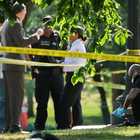 A U.S. Secret Service crime scene investigator works at the scene of an officer-involved shooting in Washington, D.C., U.S., May 4, 2026. REUTERS/Jonathan Ernst