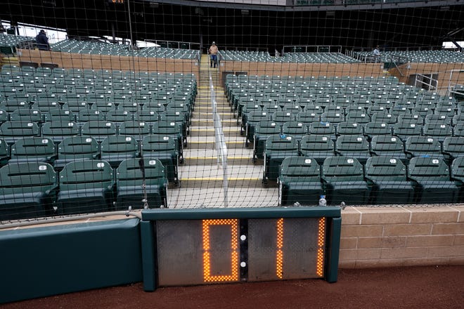 The new pitch clock is seen at Salt River Field Tuesday, Feb. 14, 2023, in Scottsdale, Ariz. Opening day will feature three of the biggest changes in baseball since 1969: Two infielders will be required to be on either side of second base, base size will increase to 18-inch squares from 15 and a pitch clock will be used. (AP Photo/Morry Gash)