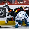 Toffoli’s 2-goal effort leads Flames in 5-3 win over Sharks