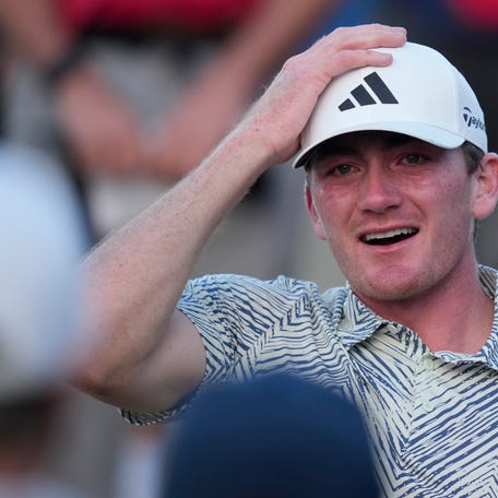 Nick Dunlap reacts after winning the American Express golf tournament, Sunday, Jan. 21, 2024, in La Quinta, Calif. (AP Photo/Ryan Sun)