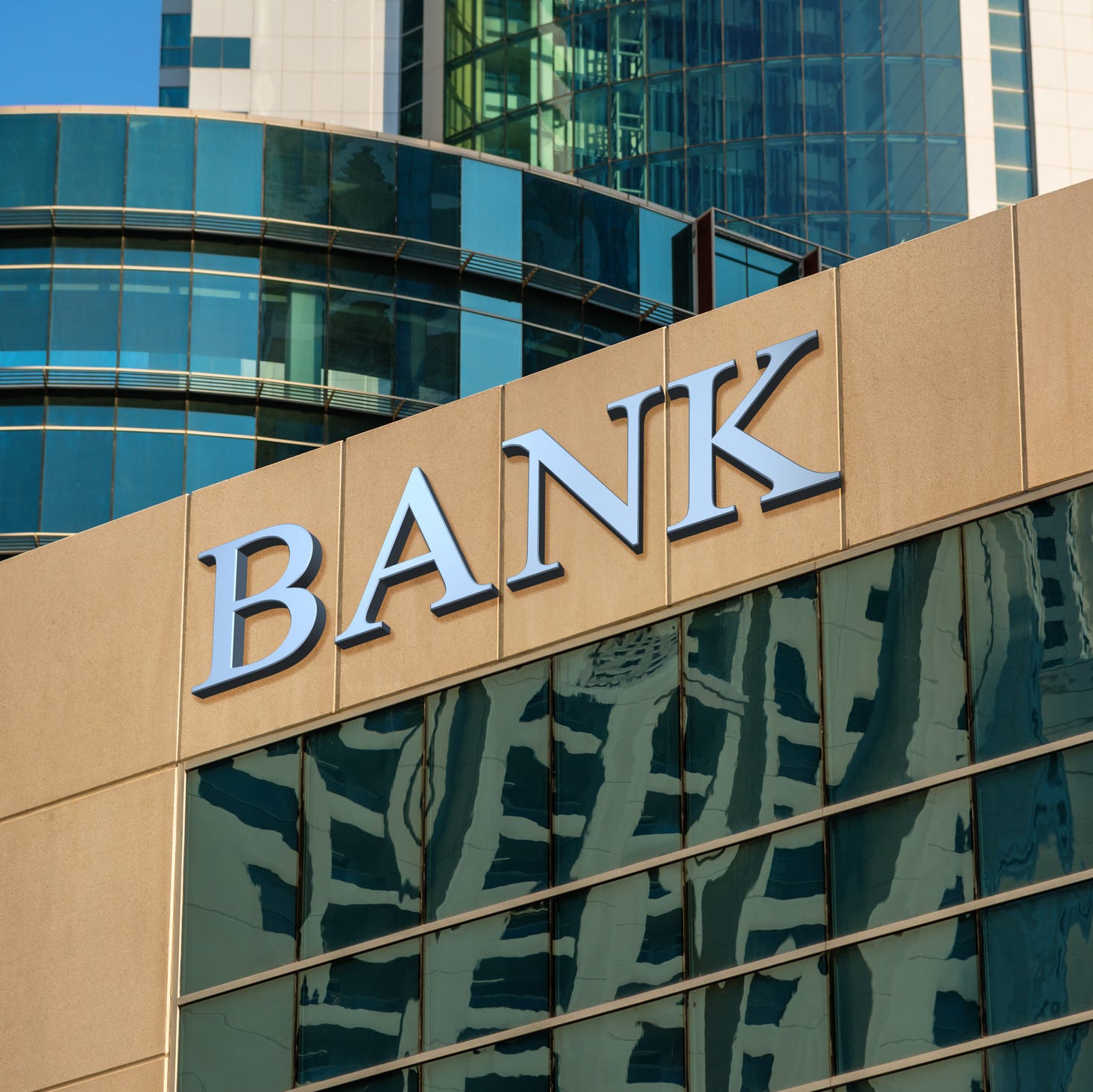 Bank sign on building.