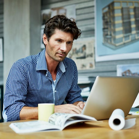 A person at a laptop.