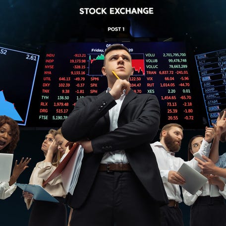 Traders at stock exchange look confused.