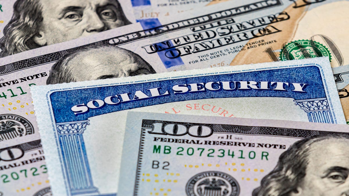Social Security card in money.
