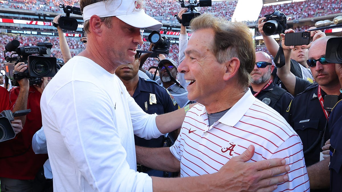TUSCALOOSA, ALABAMA - SEPTEMBER 23: Head coach Nick Saban of the Alabama Crimson Tide converses with head coach Lane Kiffin of the Mississippi Rebels after their 24-10 win at Bryant-Denny Stadium on September 23, 2023 in Tuscaloosa, Alabama. (Photo by Kevin C. Cox/Getty Images)