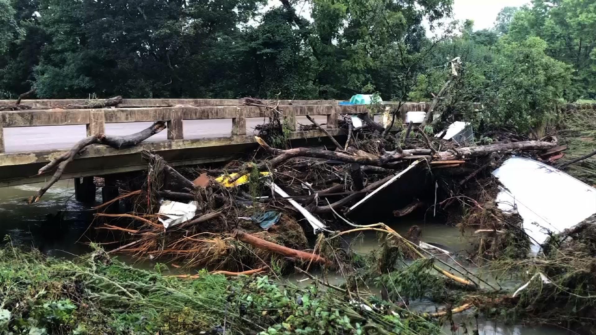 Tennessee flood kills at least 10, dozens missing
