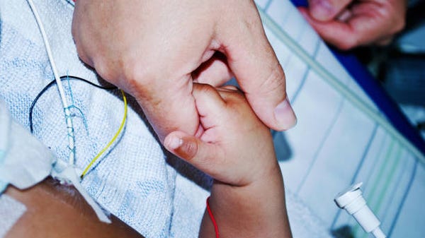 Smallest known baby at birth leaves hospital