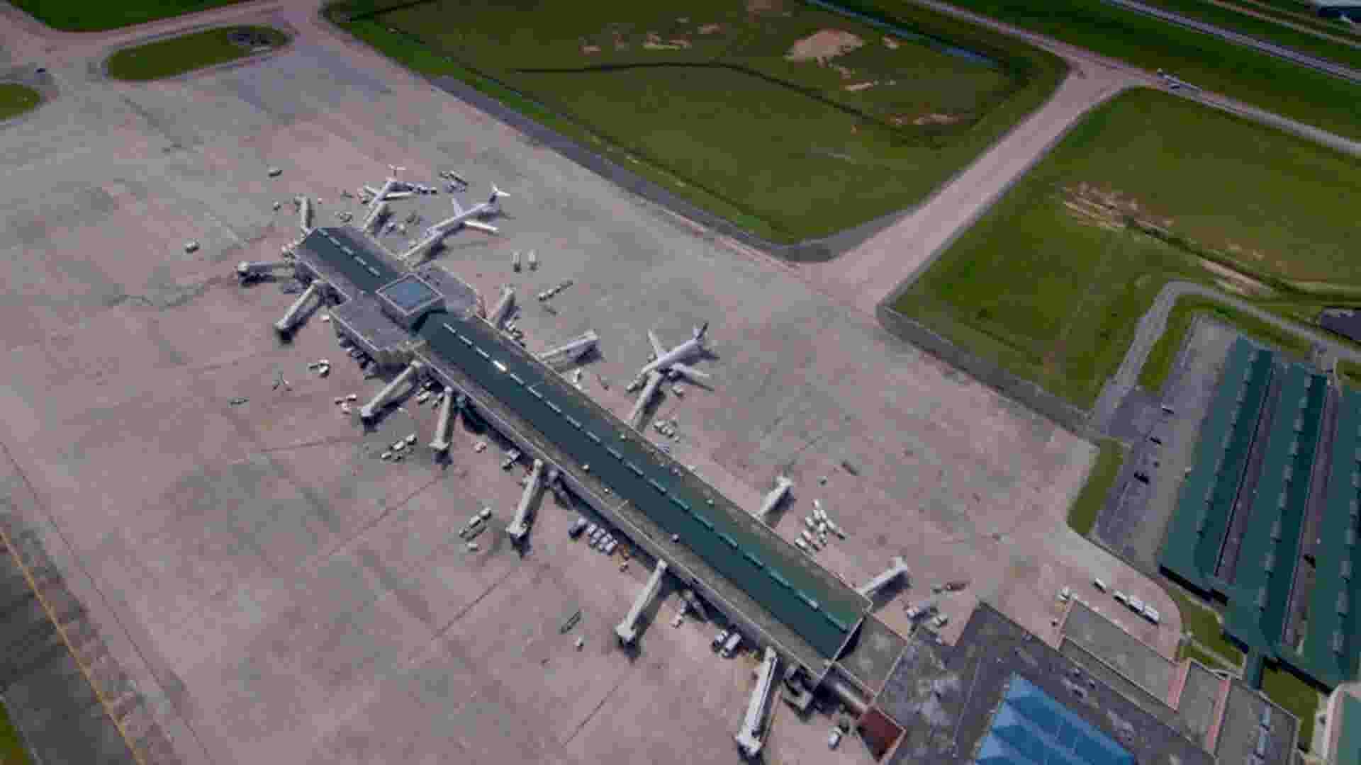 This airport has graves in the middle of the runway