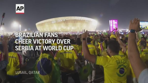 Brazilian fans cheer victory over Serbia at World 
