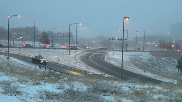 Denver finally sees 1st snowfall, latest since '34