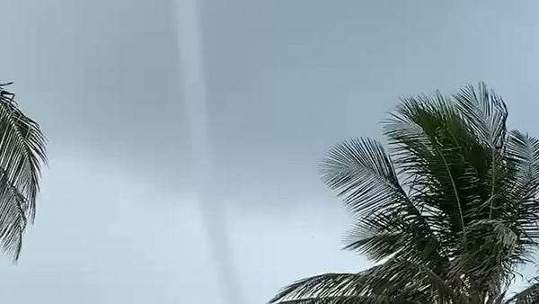 Waterspout swirls off coast of Florida