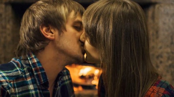 Why do we kiss at midnight on New Year's Eve?