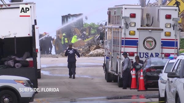 Floridians and visitors gather at collapse site