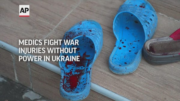 Medics fight war injuries without power in Ukraine