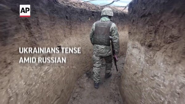 Ukrainians tense at frontline amid troop build-up
