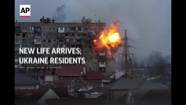 New life arrives; Ukraine residents flee or hide