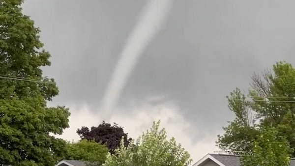 Iowa tornadoes: See a funnel cloud moving near Sta