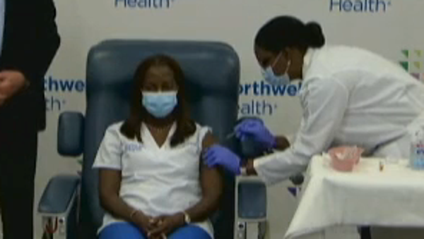 WATCH: Frontline nurse receives first COVID vaccin