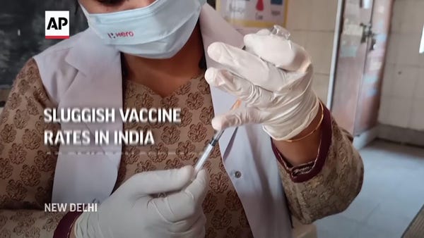 India vaccine rates sluggish as omicron spreads