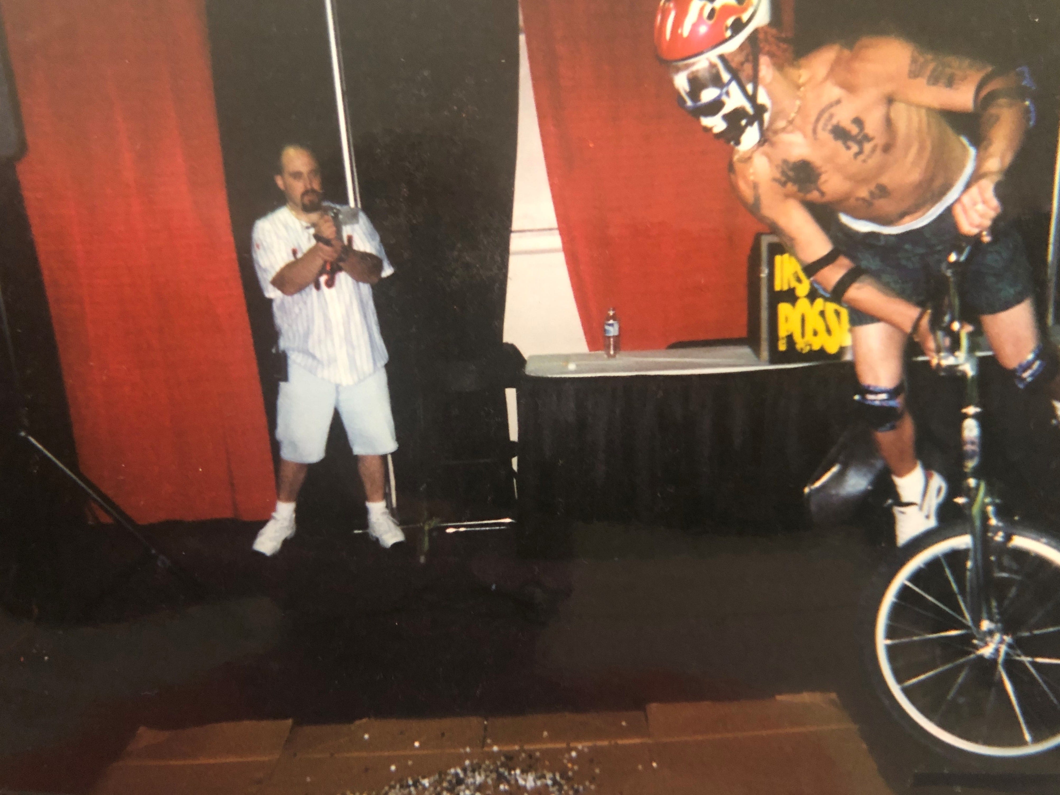 Shaggy 2 Dope launches himself onto a bed of thumb tacks (ouch!) at the Gathering of the Juggalos.