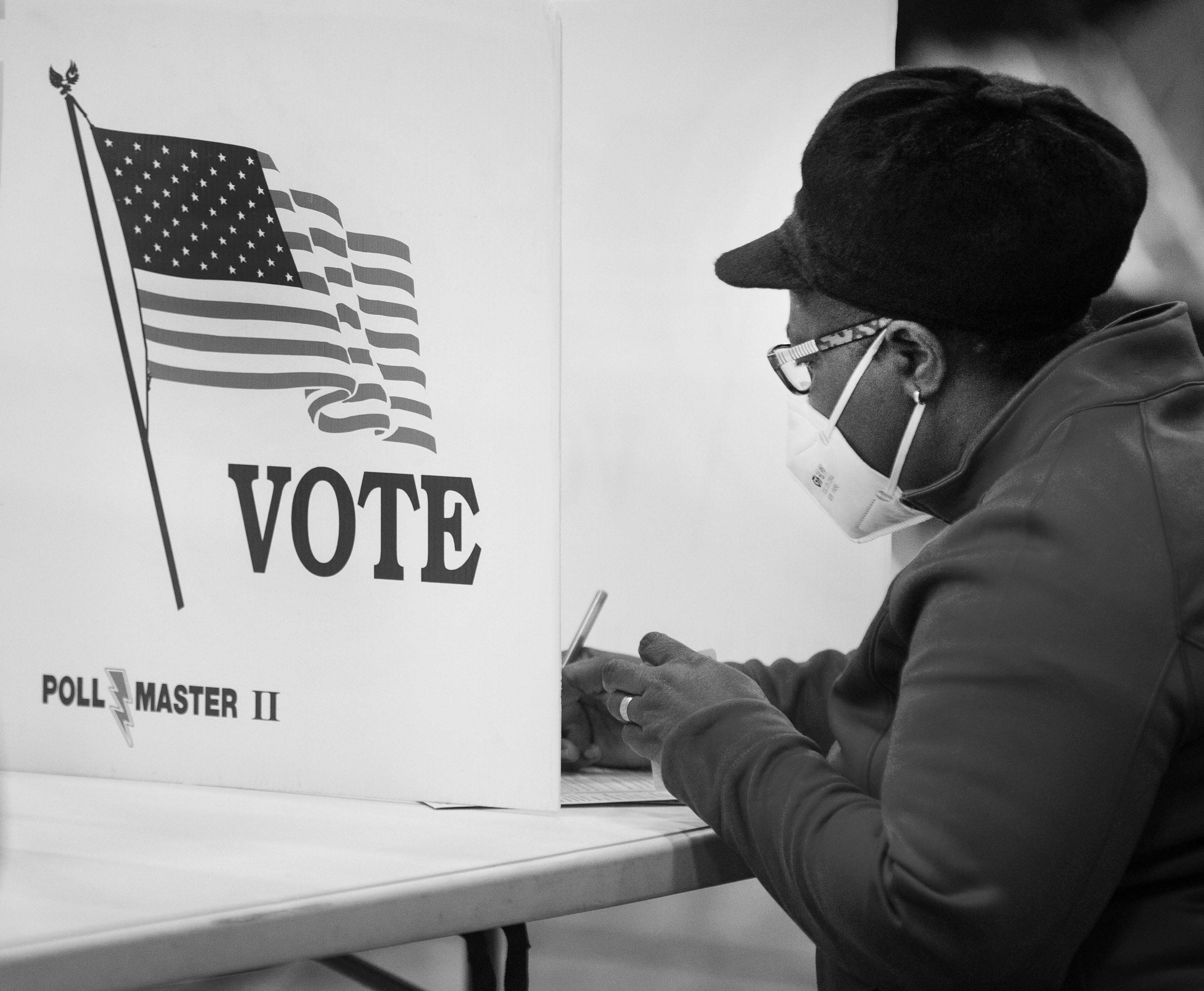 A woman votes at Creekside Elementary in Fairfield, Ohio, on Election Day