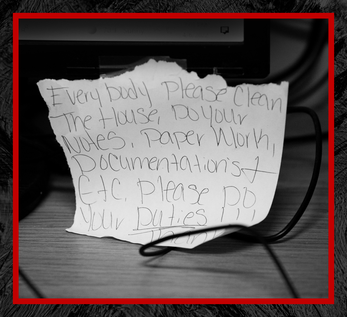 A black and white photo shows a torn piece of paper with a note on it from Tre'Asia Anderson to other staff reads: 