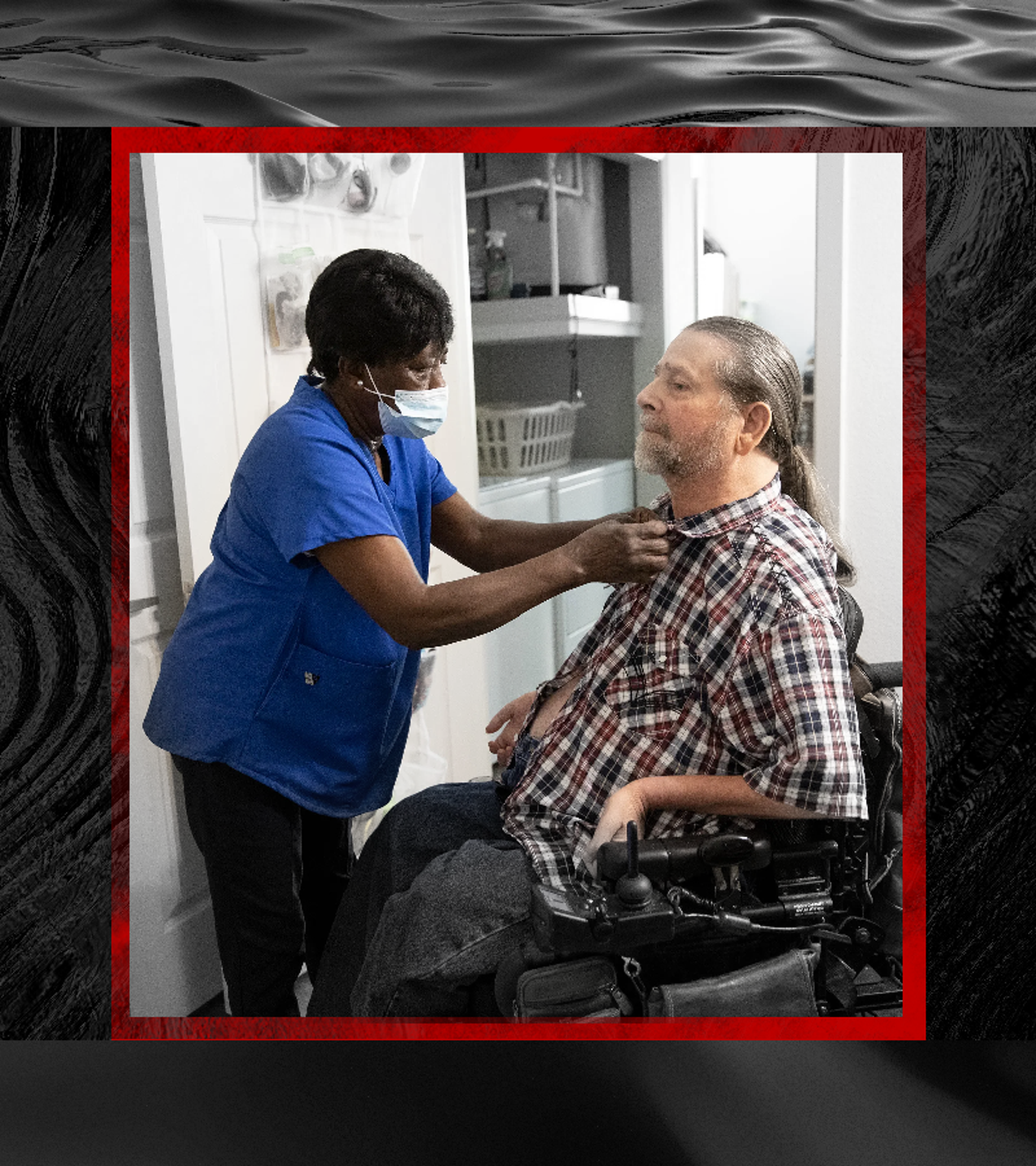 Home health caregiver Shirley Eason works on the buttons at Gene Rodgers' shirt collar. The photo is desaturated except for Eason, who is standing, and Rodgers, who is seated. A border of dark water surrounds the photograph.