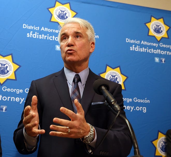 Then-San Francisco District Attorney George Gascon announces the filing of a civil consumer-protection action against Uber in December 2014.
