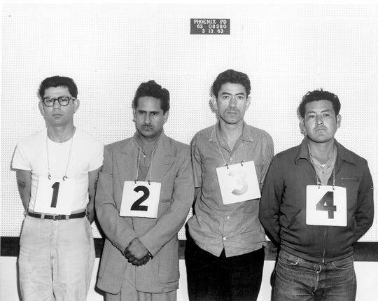 Ernesto Miranda (far left in glasses) in a Phoenix police lineup the day he was arrested in a rape case in 1966.