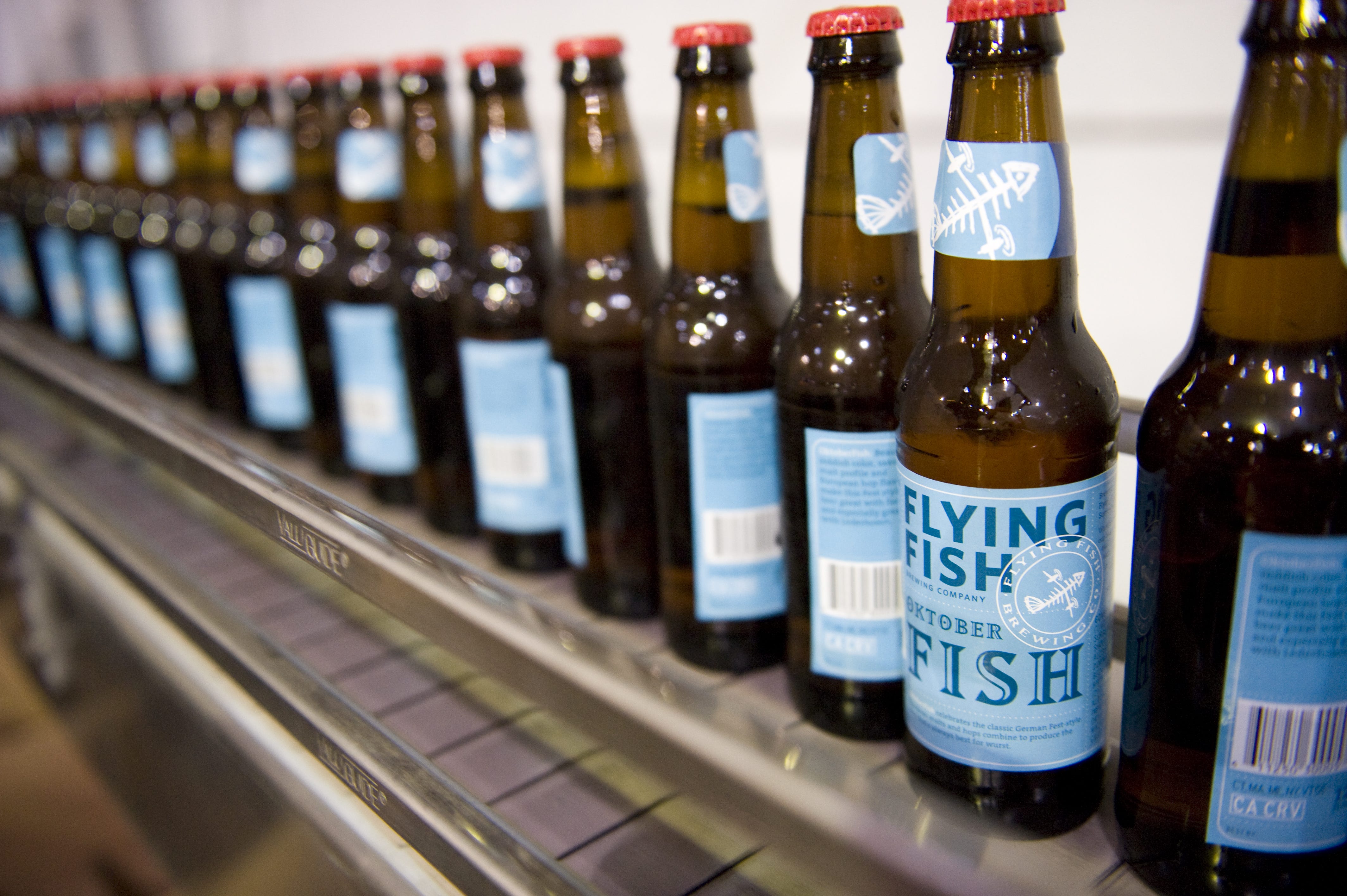Flying Fish bottles come off an automated bottling machine at the Somerdale brewery shortly after the brewery moved from Cherry Hill in 2012.