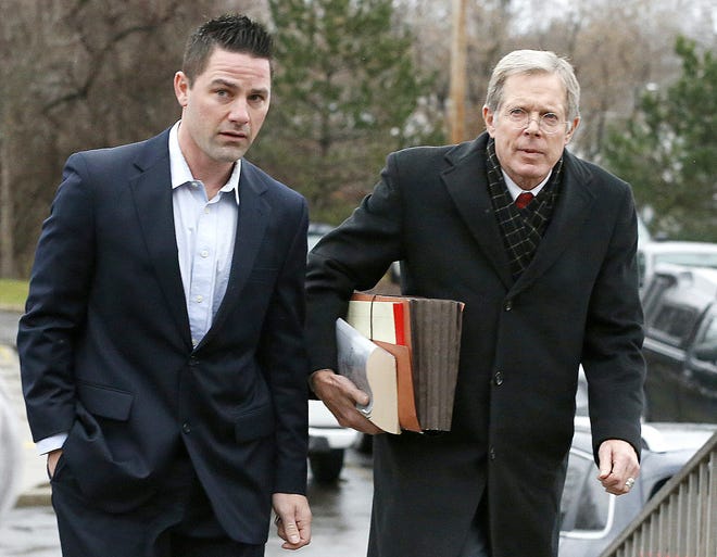 Murder suspect Thomas Clayton, left, walks with his lawyer Ray Schlather to Steuben County Court on Dec. 17, 2015.