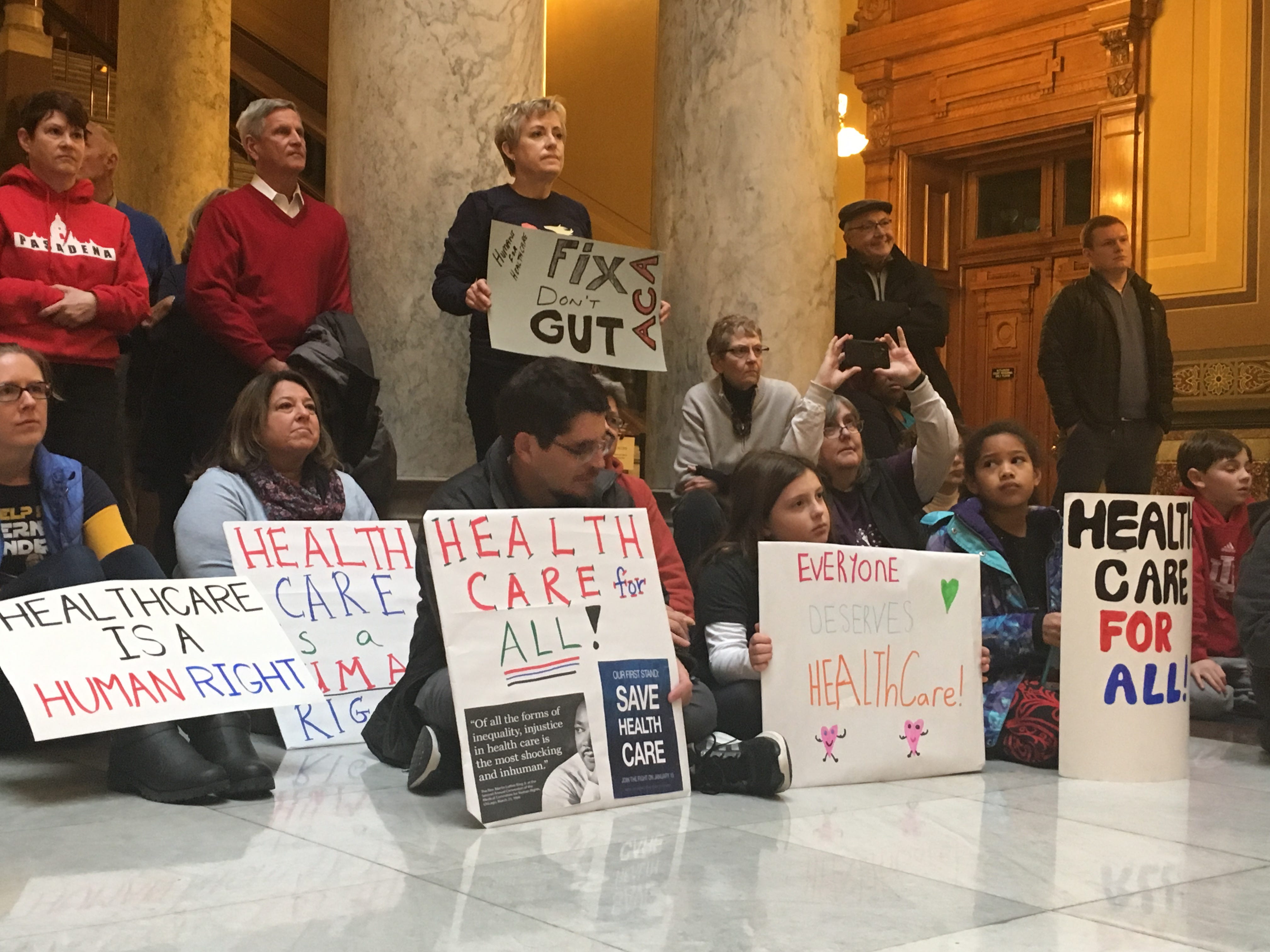 Protesters push back against repeal of Obamacare at Indiana Statehouse
