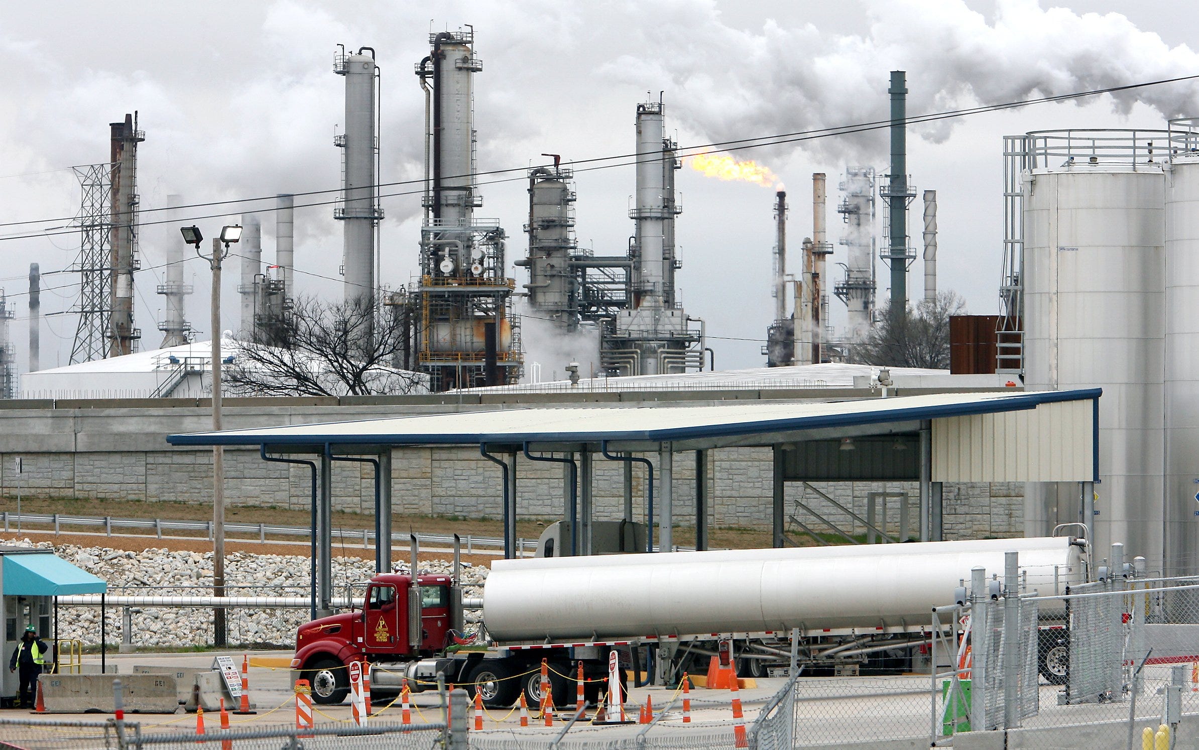 Tanker trucks refill at the Valero Refinery facility at Rivergate Industrial Port in south Memphis.