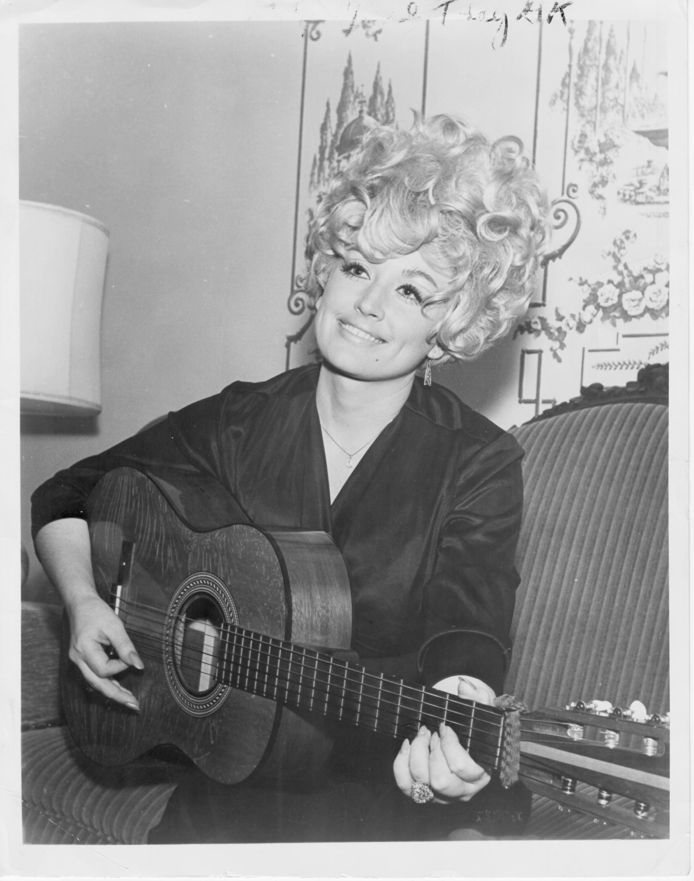 Dolly Parton, seen in 1970, says her uncle taught her the chords on the guitar.