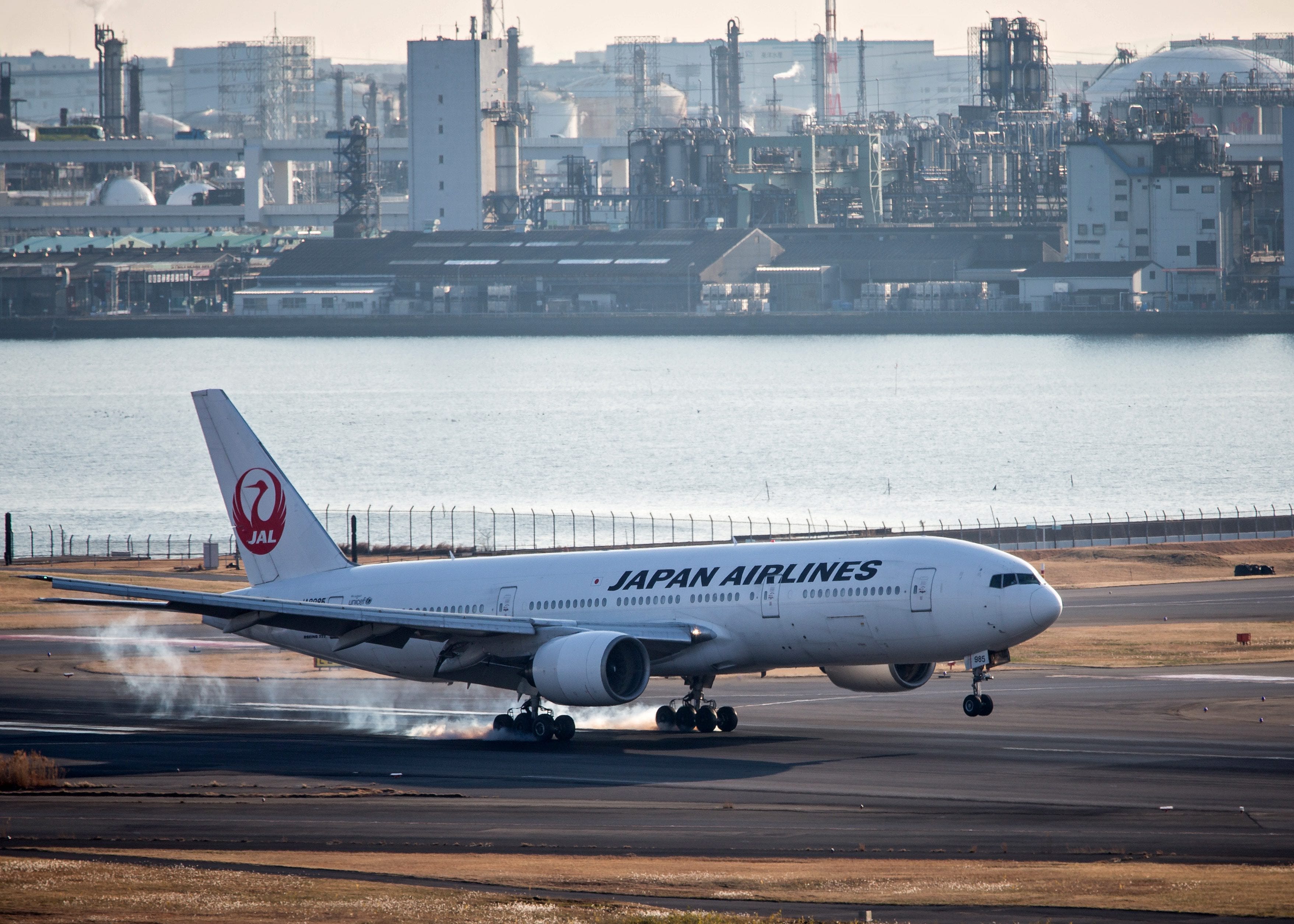 a japan airlines (jal) boeing 777 is seen landing at