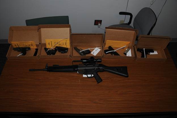 IMPD seizes guns, drugs in raid