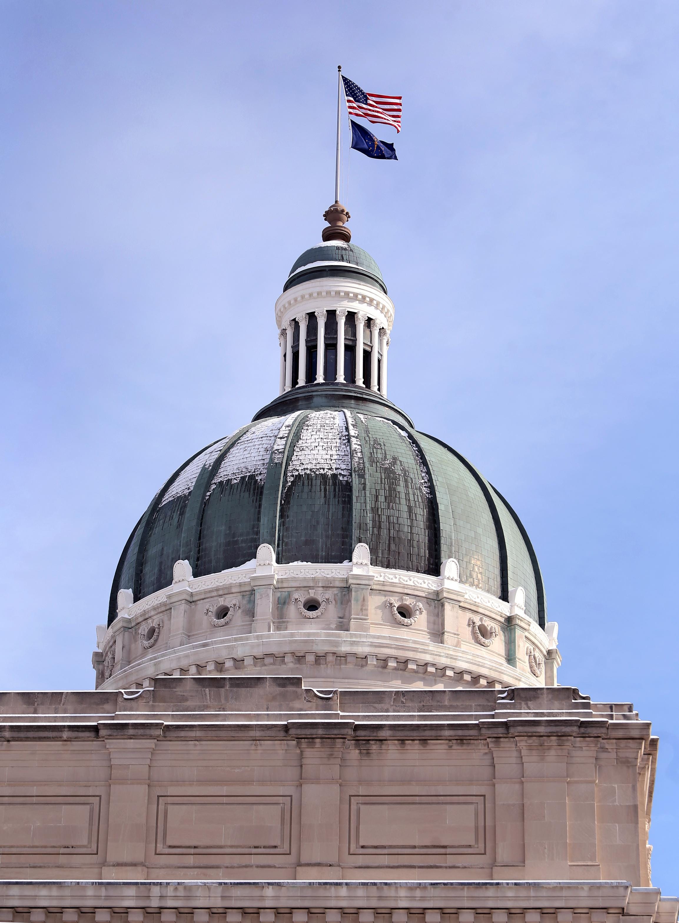 2 bills, 2 views on guns and domestic violence