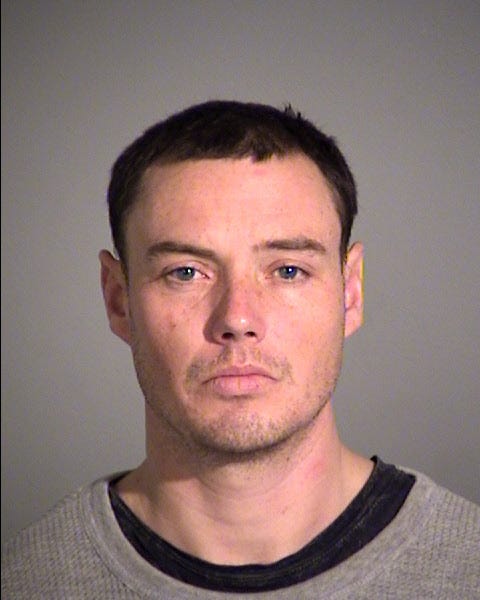 Man arrested after allegedly slashing tires at airport