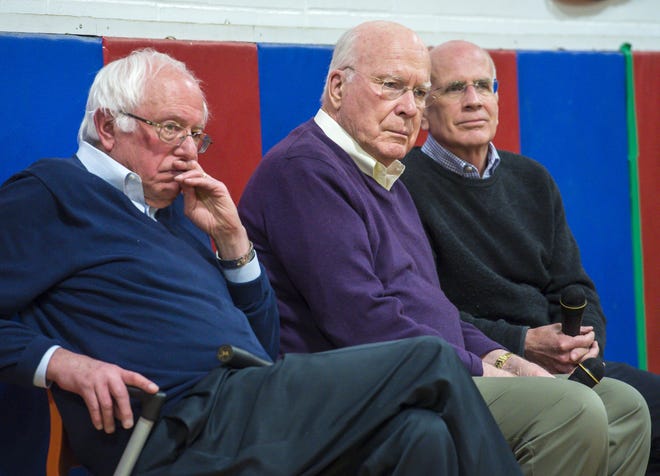 Vermont’s congressional delegation, from left, Sens. Senators Bernie Sanders and Patrick Leahy, and U.S. Rep. Peter Welch listen to a question from an audience member during a town hall meeting at Hazen Union High School in Hardwick on Saturday.