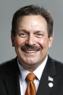 She couldn't bring a sign into a county commission meeting. Did Hamilton County violate her free speech rights?