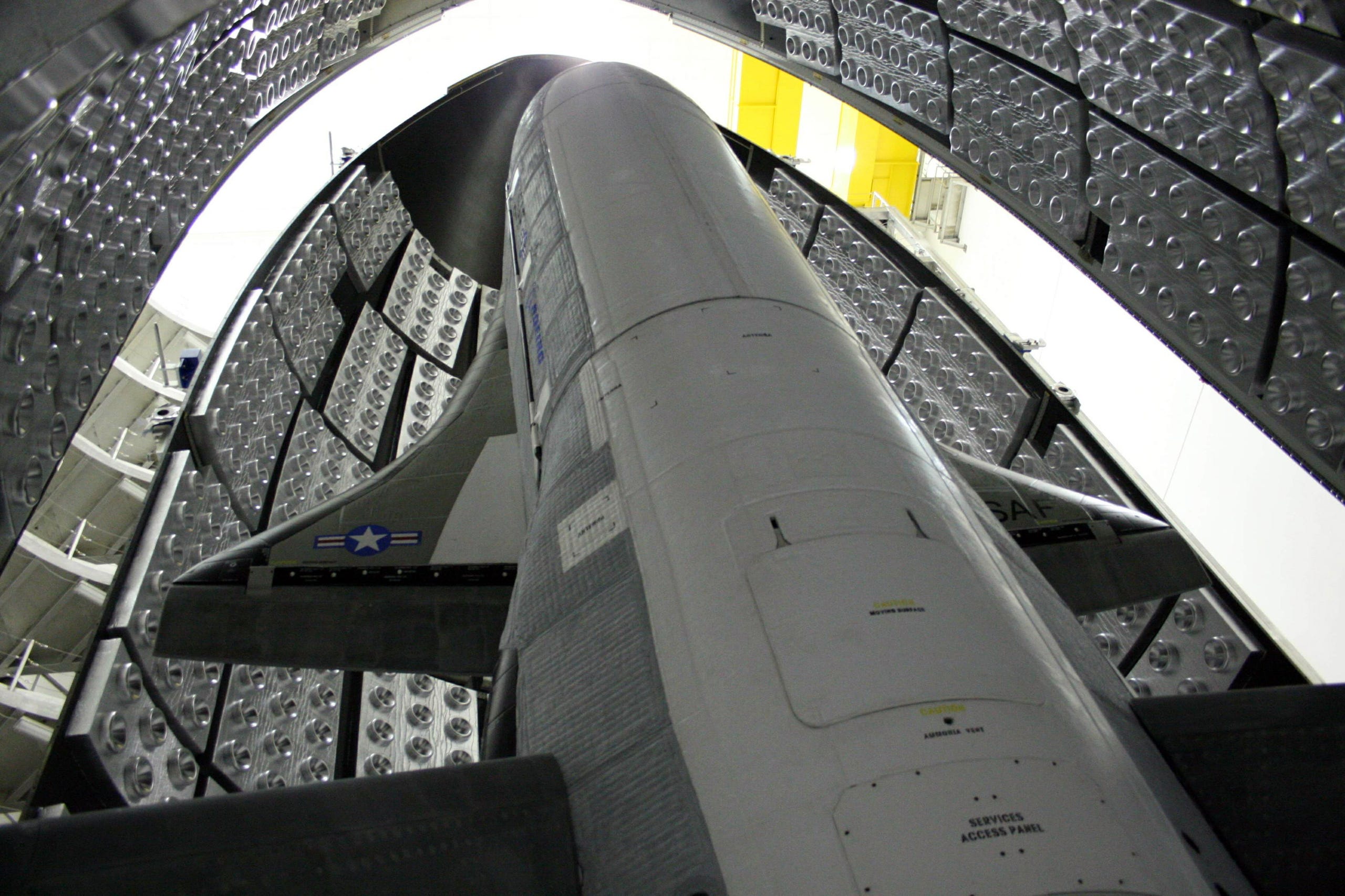 The X-37B Orbital Test Vehicle in the encapsulation cell at the Astrotech facility in Titusville, Fla., in April 2010.