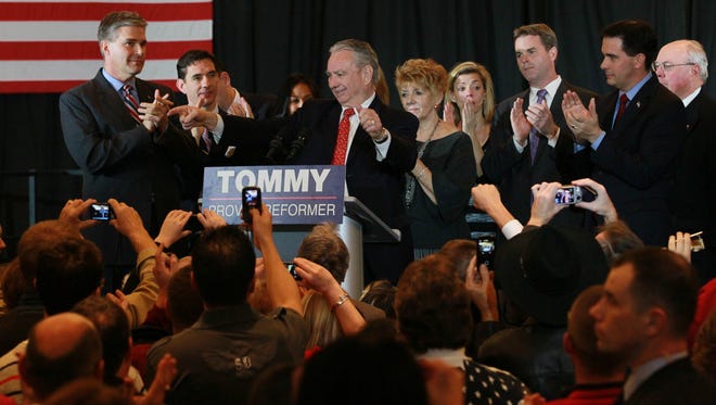 Tommy Thompson, surrounded by Gov. Walker, J.B. Van Hollen and family, gives his concession speech in the 2012 U.S. Senate race.